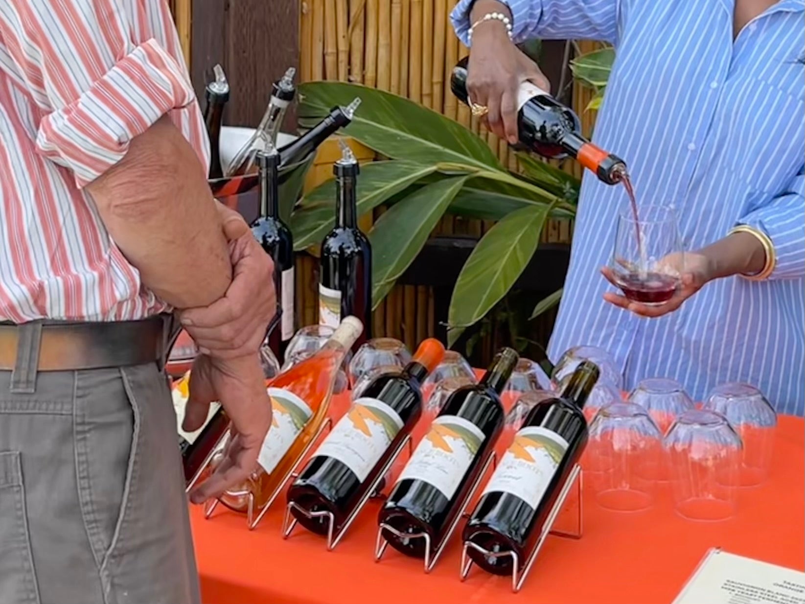 Pouring Wine into a Stemless Glass, Orange Boots Wine